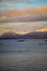 Snow-capped mountains at sunset, Akranes, Iceland