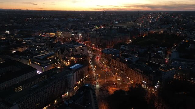 sunset sky munich city center traffic street square train station district aerial panorama 4k germany