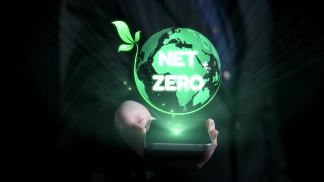 A hand holding a smartphone displays a glowing green Earth with net zero icons, symbolizing sustainability, climate action, and the future of environmental consciousness. Qubit