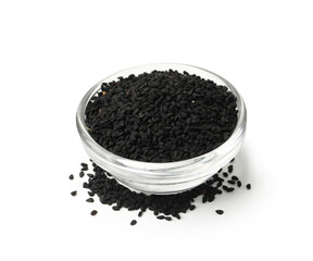 Black cumin seeds in bowl isolated on white