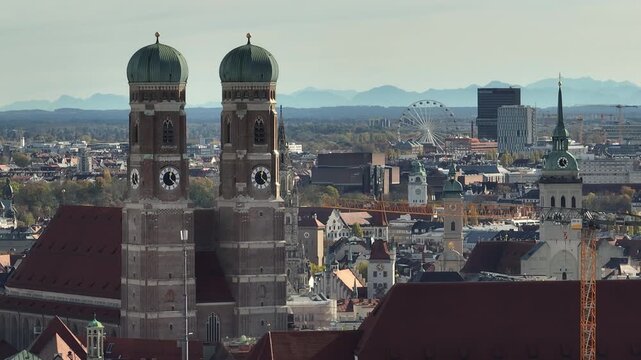 sunny day munich city center famous church front exterior aerial panorama 4k germany