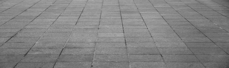empty stone floor top in perspective. grey tile floor background in perspective view. line. empty copy space stone street. pavement. Granite outdoor tiled floor. gray granite. Marble texture © Maxim Chuev