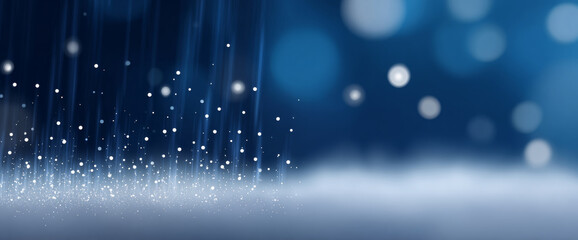 Abstract blue background with glowing white particles and vertical light streaks creating a dreamy, ethereal atmosphere with bokeh effects
