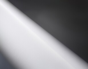 abstract white surface with a diagonal shadow creating a light and dark contrast area on surface