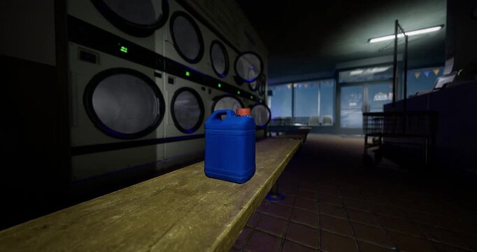 A blue container sits prominently on a wooden table in a laundromat. The surroundings feature large, round washing machines and a faint blue light adding to the atmosphere.