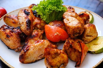 Delicious plate of juicy and hot buffalo chicken wings. High quality photo
