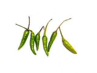 green chili peppers. green hot chili peppers with slices isolated on white background top view. Fresh green Chillies AS ingredients of cooking delicious hot food.