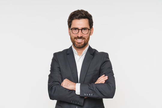 Happy business man leader, smiling stylish professional executive, confident businessman or fashion model wearing suit looking at camera standing isolated white background, portrait.