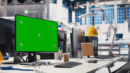Copy space screen PC in photovoltaics factory used to manage system performance. Chroma key on computer tracking solar panels manufacturing plant energy production and efficiency.