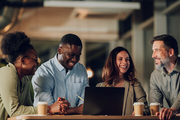 Diverse business team collaborating during office meeting
