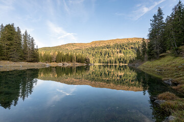Summer time at romantic forest Lake Obernberg scenic mountain lakes landscape in Austria, Tyrol