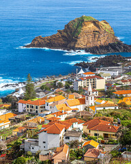 View of the small resort village of Porto Moniz on the Atlantic coast of Madeira Island, Portugal