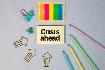 On the reporting chart there is a plate with the inscription - CRISIS AHEAD