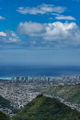 Pālolo Valley with the city skyline of Honolulu. Mauʻumae Ridge Trail (Puʻu Lanipō), Oahu, Hawaii. Koʻolau Range, shield volcano. On the right is Waʻahila Ridge