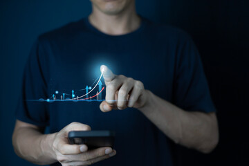 Man touching a glowing stock market chart representing financial growth and investment strategy for business