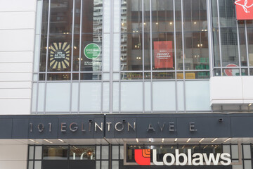 Fototapeta premium exterior building facade sign of Loblaws Eglinton Avenue, 101 Eglinton Av E, Toronto