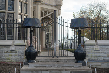 Fototapeta premium gated west exterior entrance to Casa Loma located at 1 Austin Terrace, Toronto