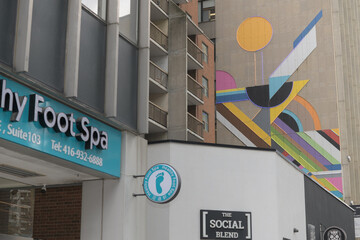 Fototapeta premium Healthy Foot Spa Massage and other buildings near 120 Eglinton Av E, Toronto