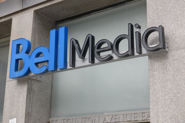 Fototapeta premium close-up of Bell Media sign outside location at 50 Eglinton Av E, Toronto
