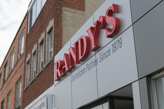 exterior building facade and sign of Randy's Take-Out, a Caribbean restaurant, located at 1569 Eglinton Av W, in Little Jamaica, Toronto