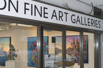 Fototapeta premium exterior view of entrance with signs of Hazelton Fine Art Galleries located at 1255 Bay St, Toronto