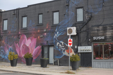 Naklejka premium mural facing Chamberlain Av outside Sushi Zuki, a sushi restaurant, located at 2030 Eglinton Av W, Toronto