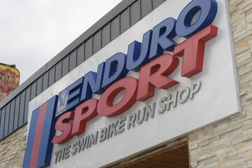 Fototapeta premium exterior building facade and sign of Enduro Sport, a bicycle shop, located at 812 Eglinton Av E, Toronto