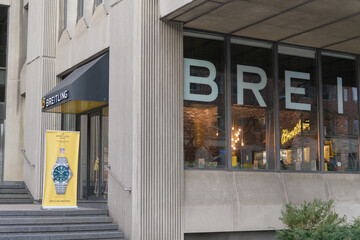 Fototapeta premium exterior building facade and sign of Breitling Boutique, a watch store, located at 250 Bloor St E, Toronto