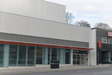 Fototapeta premium exterior building facade and sign of Forest Hill LRT Station located at 842 Eglinton Av W, Toronto