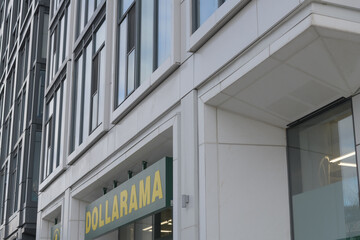 Fototapeta premium exterior of condo and shop sign for Dollarama located at 859 Eglinton Av W, Toronto