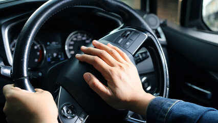 The driver is honking the horn to prevent an accident