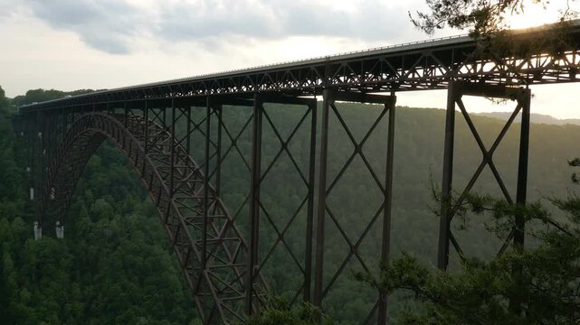 The New River Gorge Bridge along route 19 in the Appalachian Mountains of West Virginia. Shot during sunset.