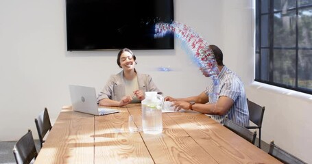 Colleagues discussing, AR globe appearing, obscuring pair, forming ring, highlighting business data - Powered by Adobe