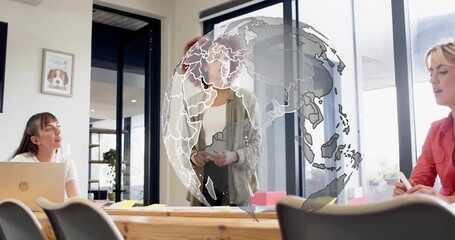 Lead explaining, gesturing and offering marker causing globe overlaying rotating fading in business - Powered by Adobe