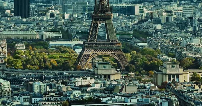 Aerial panning view of the historic center of Paris with the Eiffel Tower at summer day. Panorama of Paris from above. Aerial View on Eiffel Tower and Champ de Mars