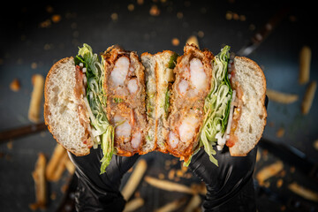Delicious Fried Shrimp Sandwich Cross-Section with Crispy Fries