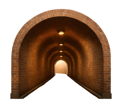 Arched pedestrian tunnel with brick walls and overhead lighting.