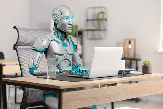 Replacing humans with artificial intelligence. Robot working at table in office. Futuristic technologies - Powered by Adobe