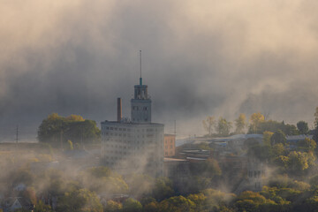 Aerial View of a Town Along The Mississippi River with Fog Clouds