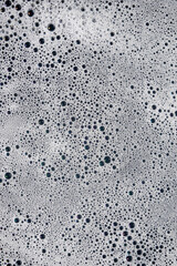 Vertical background pattern and texture white bubbles surface detergent water. For graphic design, 3D rendering and banners