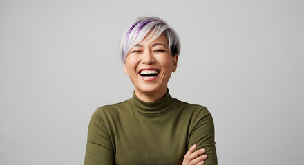 A cheerful woman with a vibrant smile, her laughter echoing joy and confidence, radiating a sense of positivity and authentic happiness for all to see.