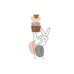 Hand balancing cups and abstract shapes on white background.