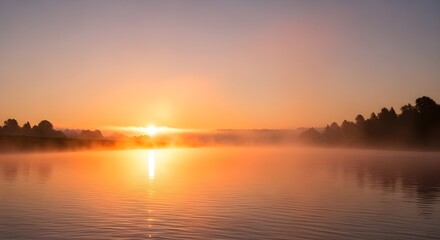 Fototapeta premium Beautiful orange and red sunlight reflects a serene lake and river landscape at peaceful sunrise and sunset, highlighting the dramatic cloud-filled sky and calm water
