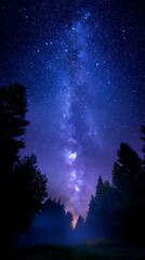 Naklejka premium Night Sky Milky Way Galaxy Over Forest with Bright Stars and Deep Blue Colors