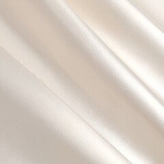 Obraz premium A soft, white fabric drapes elegantly, showcasing gentle folds and creases that catch the light, creating a subtle play of shadows and texture.