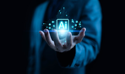 A business professional holding a glowing AI chip hologram, symbolizing artificial intelligence, digital innovation, advanced technology, and the power of data-driven solutions in modern business.