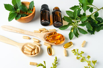 Medicine herbal organic capsule vitamin E omega 3 fish oil drug herbs leaf natural supplements