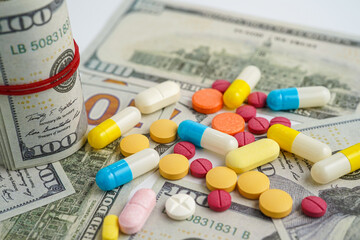 Pills on money dollars, Medicine prescription drugs cost concept, healthcare expenses