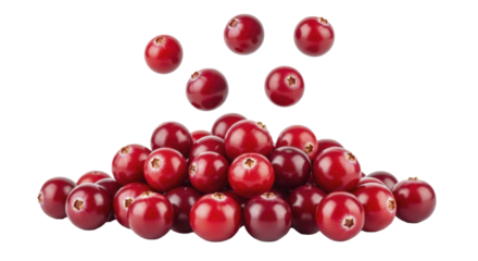 Fresh vibrant cranberries pile with falling berries on a transparent background PNG image