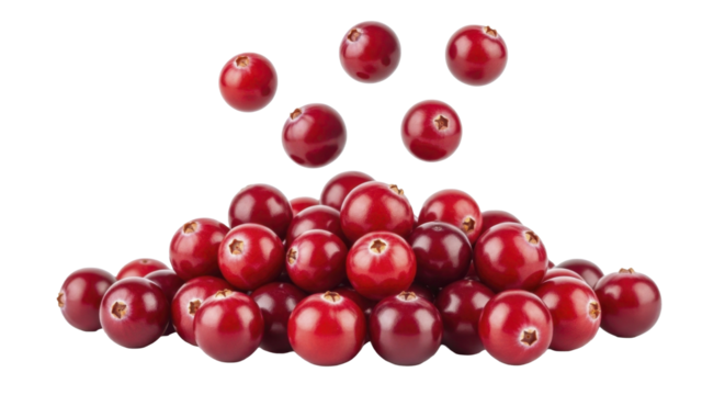 Fresh vibrant cranberries pile with falling berries on a transparent background PNG image